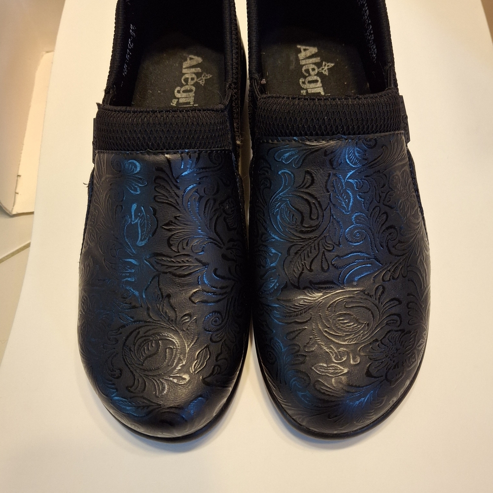Alegria Black Embossed Slip-Ons
